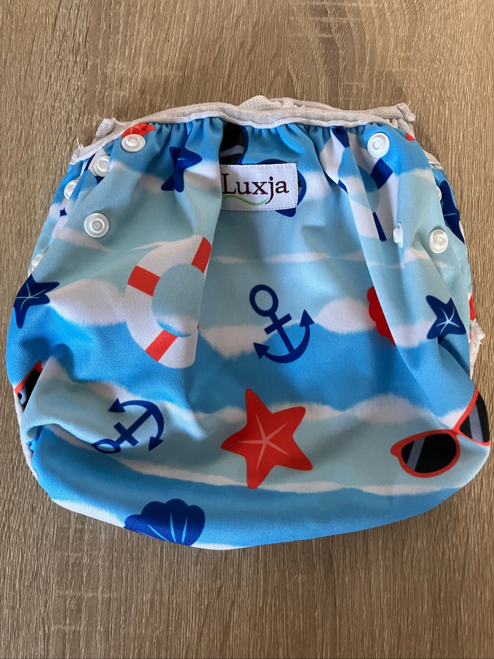 Couche de bain lavable évolutive 